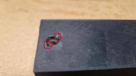 Second post-test view of the shear damage where the wing nut pulled into the counterbore cavity