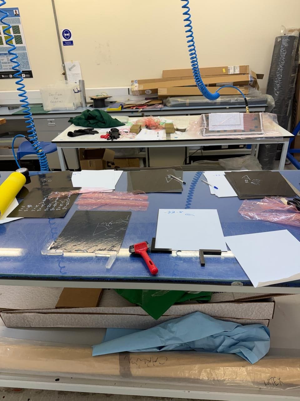 Hand layup of spread-tow thin-ply prepreg onto the tool plate